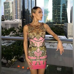 Stunning pink dress with Tiger Details.